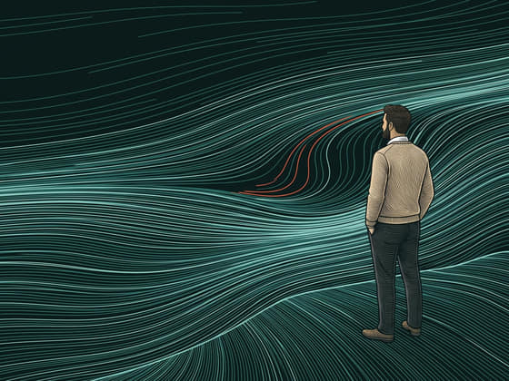 a man in an oatmeal sweater stands at the edge of a current of fine teal lines; a few lines break away in coral